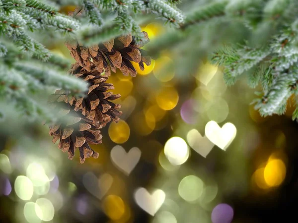 Christmas Tree Branch Cone Bokeh Light Heart Sumbol Gold Bakcground — Stock Fotó