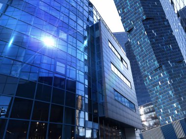 modern buildings sun flares on  window glass  in business centre sunny brighrt  weather  urban template background