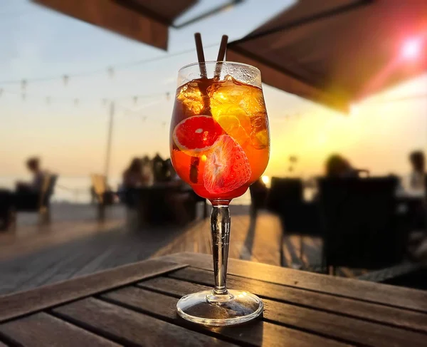 Glass Fruit Water Aperol Wooden Table Beach Cafe Sunset Sea — Foto Stock