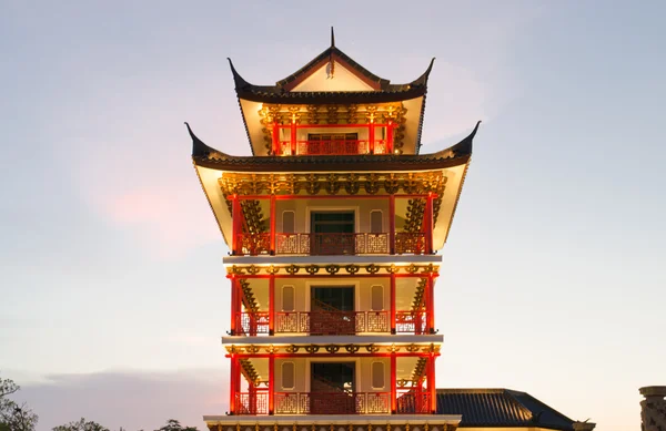 Chinese style tower on sunset background — Stock Photo, Image