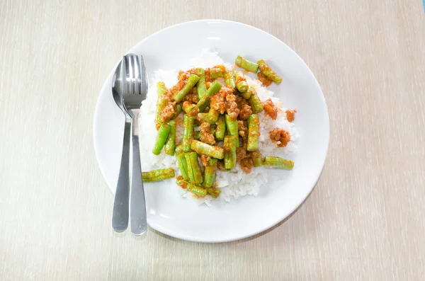 Stir fried pork and curry paste wite rice — Stock Photo, Image