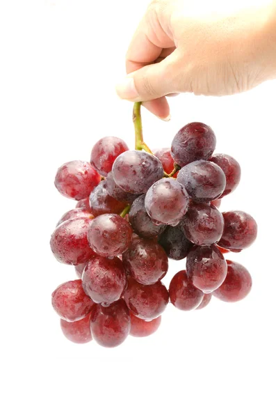 Uvas rojas frescas aisladas sobre blanco — Foto de Stock