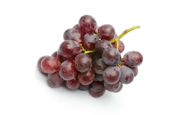 Uvas rojas frescas aisladas sobre blanco — Foto de Stock