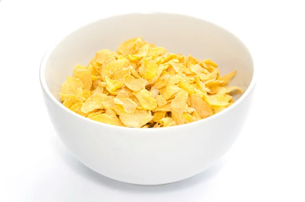 Corn flakes in bowl isolated — Stock Photo, Image