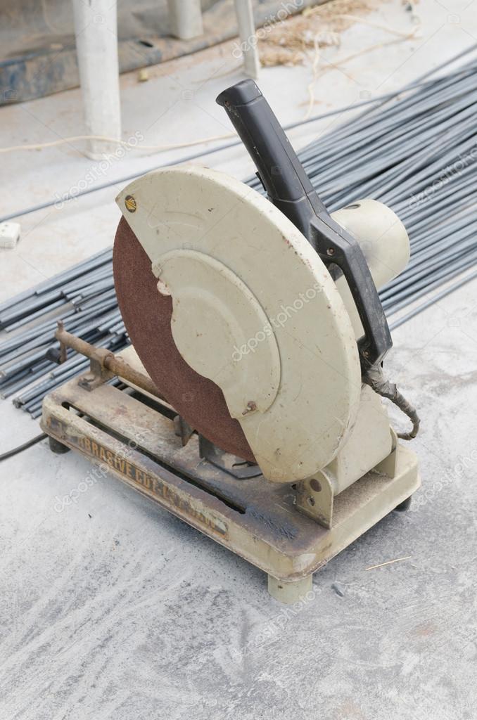 Steel rod cutting machine. — Stock Photo © chat_a4 42483265