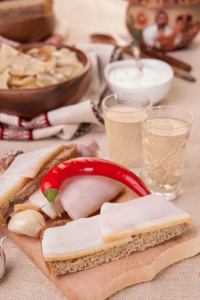 Ukrainian national appetizer and liqueur with horseradish — Stock Photo, Image