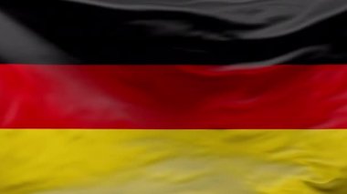 Almanya bayrağı rüzgarda sallanıyor. 3D animasyon. Almanya Ulusal Bayrağı. Deutschland bayrağı dikişsiz döngü animasyonu. Almanya bayrağını yakın çekimde salla. Haberler için, Alman Birliği Günü.