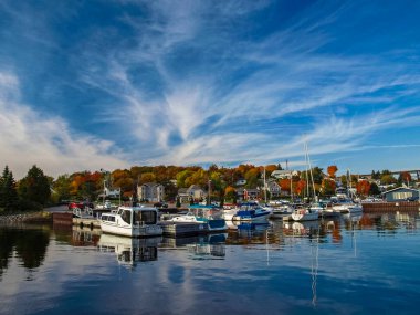 Georgian Bay of Lake Huron, Canada - October 20, 2018: Autumn landscape on Lake Huron, view of the coastal city from the bay. clipart