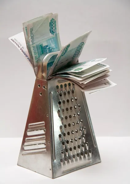 Dinero en rallador — Foto de Stock
