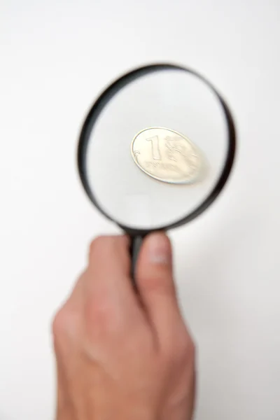 Hand with loupe — Stock Photo, Image