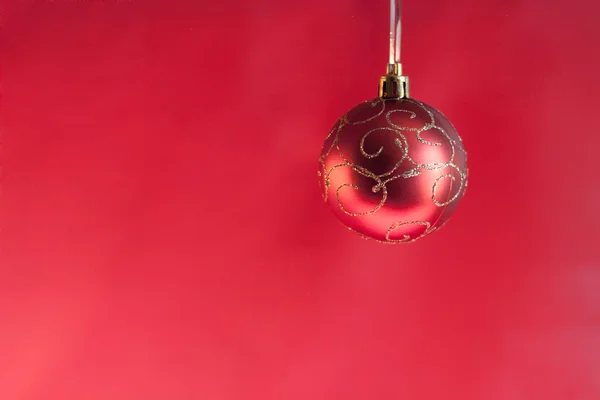 Christmas ball on abstract light — Stock Photo, Image