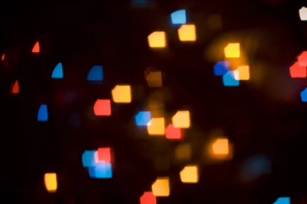 Luzes coloridas em forma de bokeh quadrado — Fotografia de Stock