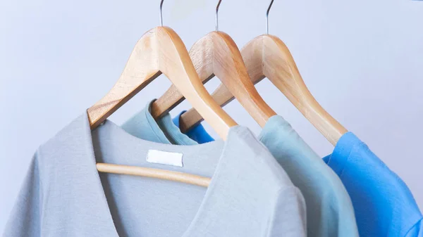 Women Clothes Hanging Wooden Hangers Store — Fotografia de Stock