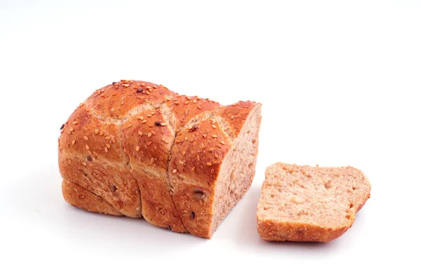 Loaf of dark bread on the board — Stock Photo, Image