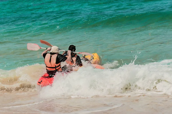 Two Athletes Compete Kayak Sea Waves Trying Swim Away Shore — Stok fotoğraf