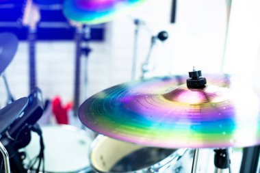 Selective focus to cymbals of drum set in music room. The concept of musical instrument.