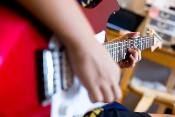 Selective Focus Finger Playing Electric Guitar Studio Room — стоковое фото