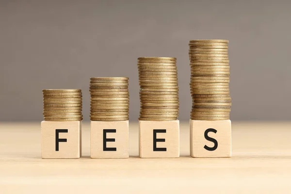 Fees Word Wooden Blocks Coins Stacked Increasing Stacks Fees Increasing — Fotografie, imagine de stoc