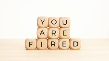 You are Fired phrase on wooden blocks. Unemployed concept