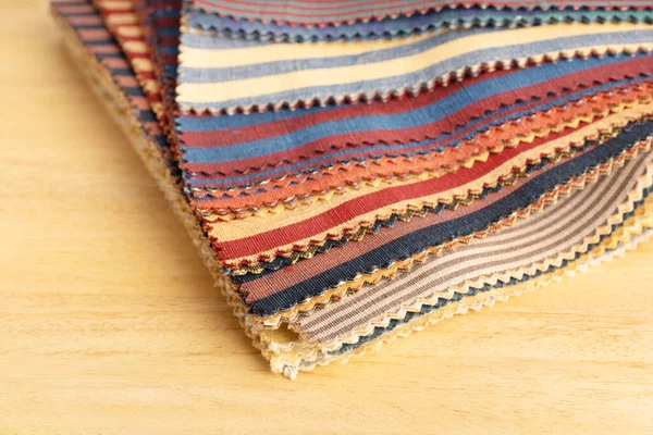 Fabric Textile Catalog Wooden Table Fabric Samples Upholstery Decoration — Photo