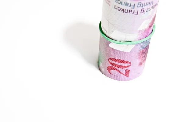 20 francos suíços em notas roladas — Fotografia de Stock