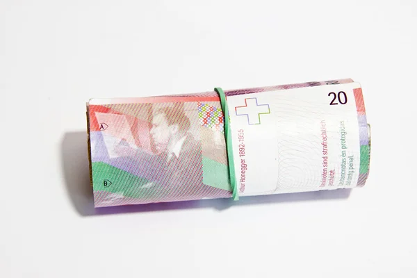 20 İsviçre Frankı cinsinden banknot haddelenmiş — Stok fotoğraf