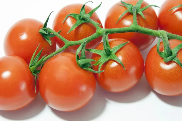 Ripe and juicy tomato over white background — Stock Photo, Image