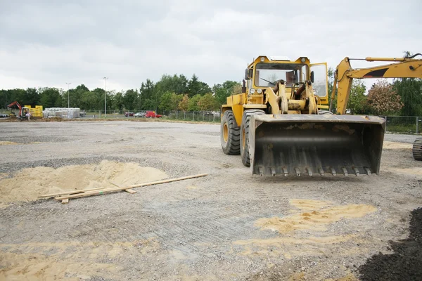 Excavator at work on a construction site — Stock Photo, Image