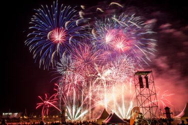 A sky lit up with fireworks.