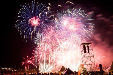 A sky lit up with fireworks.