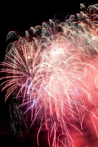A sky lit up with fireworks. — Stock Photo, Image