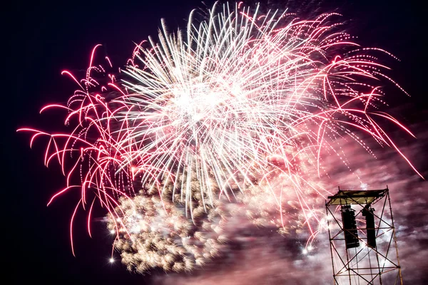 A sky lit up with fireworks. — Stock Photo, Image