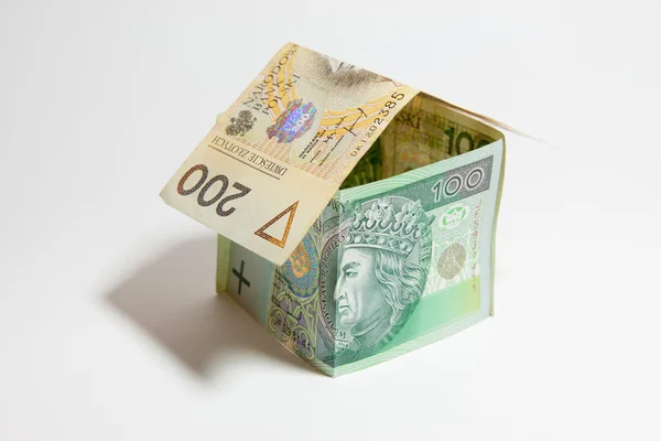 The concept of building a house, the Polish currency — Stock Photo, Image