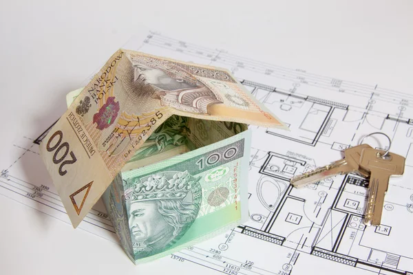 Das Konzept des Hausbaus, die polnische Währung Stockbild