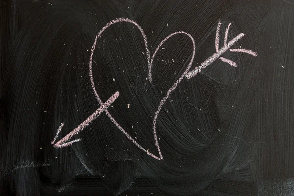 Love written on a blackboard chalk — Stock Photo, Image