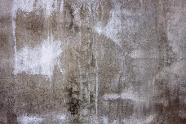 Mauerfragment mit Loch aus dem Grau des Betons — Stockfoto