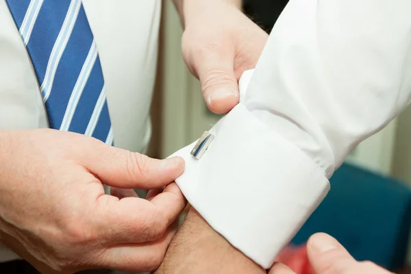 Dress shirt cufflinks in a suit — Stock Photo, Image