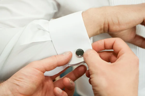 Dress shirt cufflinks in a suit — Stock Photo, Image