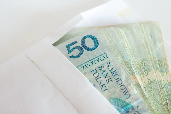 Polish zloty on a white background — Stock Photo, Image