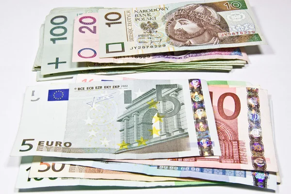 Monnaie zloty polonais et l'euro — Photo