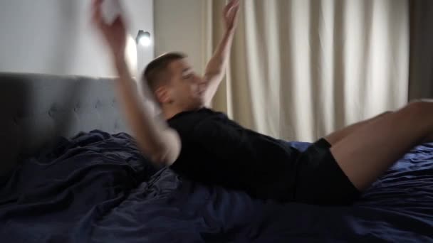 Slow Motion Guy Falls Bed His Back Running Start Landing — Stock Video