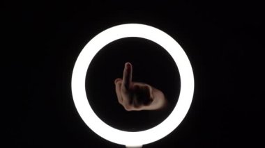 gesture package. female hands close-up make figures from fingers. finger play. Middle finger up. Obscene gesture fuck yourself