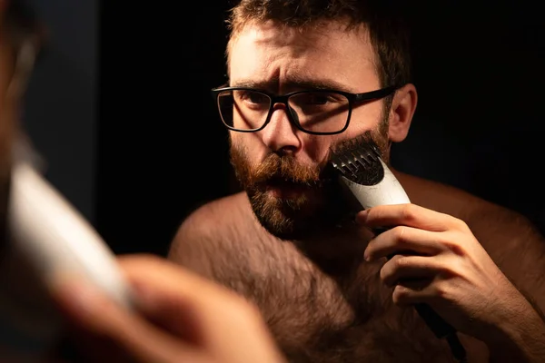 Young Man Shaving Trimming His Beard Electric Razor Bathroom Home — Stock Photo, Image