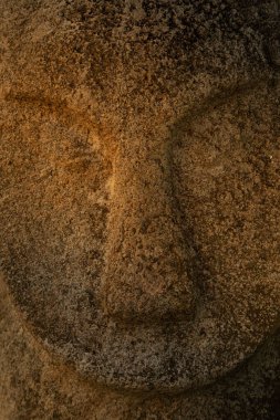 Statue of an ancestral megalith, from unknown prehistoric megalithic cultures, is located in the Bada Valley, Central Sulawesi, Indonesia
