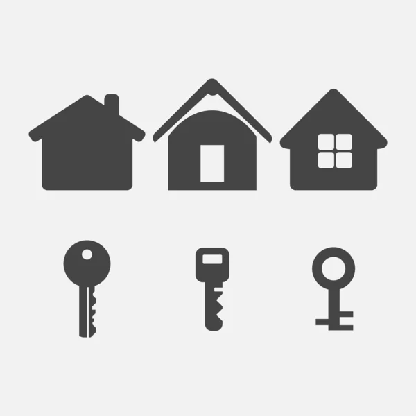 Casa y llave — Vector de stock