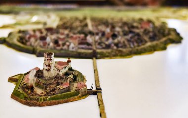 Vyborg, Russia - December 30, 2021, a small model with miniatures of the medieval city of Vyborg and the Vyborg castle