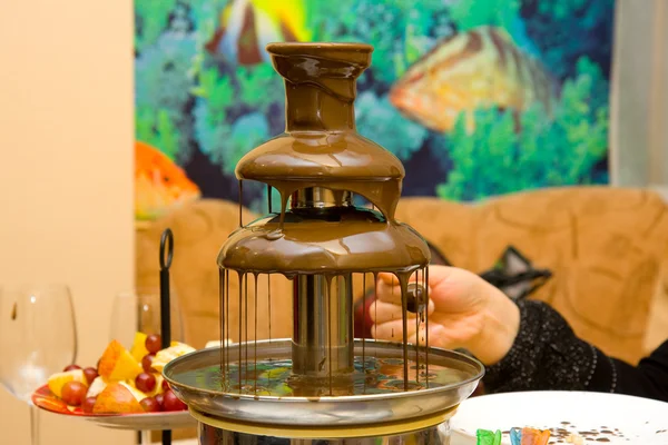 Chocolate fondue fountain — Stock Photo, Image