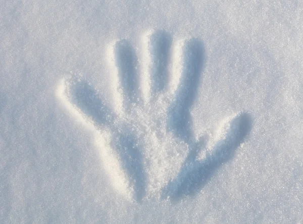 Druk dłoni w śniegu — Zdjęcie stockowe
