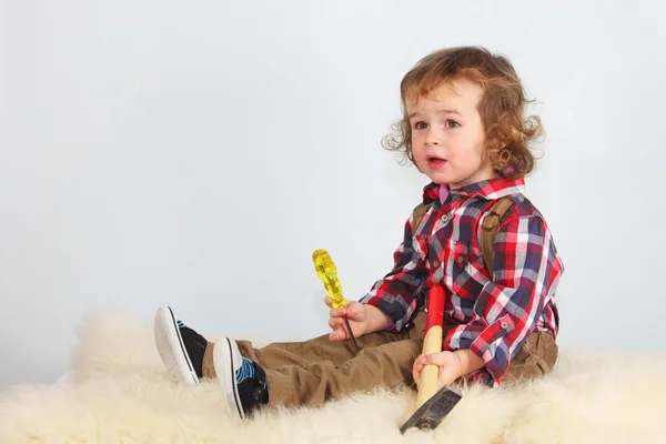 Cute child holding hummer, studio shot — Stock Photo, Image