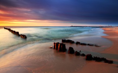 Baltic sea at beautiful sunrise in Poland beach. clipart